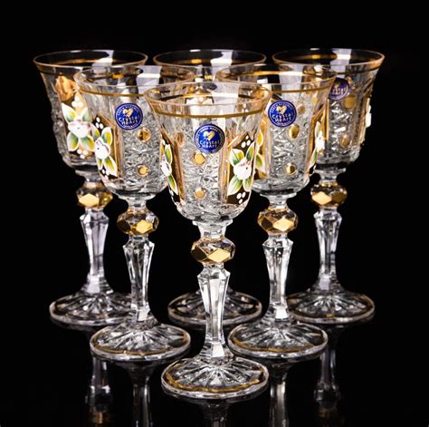 Bohemian crystal - beautiful, crystal, hand-decorated set of six glasses. 50 ml, Ø 50 mm x H 105 mm. This unique Product is made by Family company based in Novy Bor, Czech Republic since 2007. Hand made and decorated bohemia crystal by using mainly precious metals such as gold and platinum. Each product can also be made with platinum instead of gold.